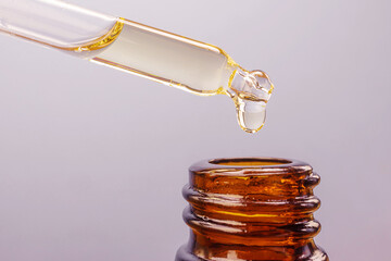 Pipette with essential oil The concept of beauty, skin care, aromatherapy, spa, cosmetology....