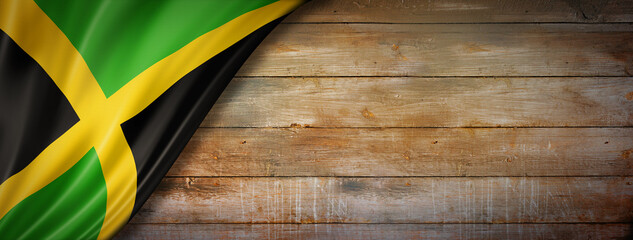 Jamaican flag on vintage wood wall banner