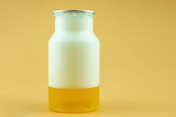 Glass of full freshly beer with foam.