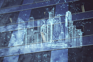 Double exposure of buildings hologram over cityscape background. Concept of smart city.