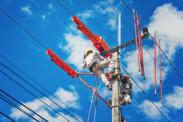 The lineman used tie stick to carve the tie wire used to wrap the electrical wires attached to the...