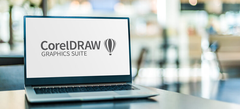 Laptop computer displaying logo of  CorelDraw Graphics Suite