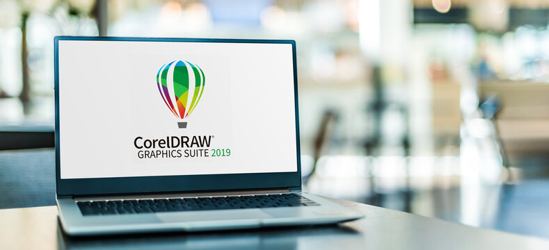 Laptop computer displaying logo of  CorelDraw Graphics Suite