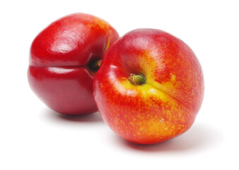 ripe nectarine on white background