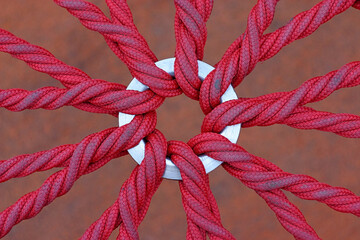 braided construction made of strong red rope