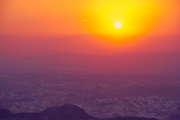 Scenic view from Oman's hills to the colorful sunset. Oman, Muscat.