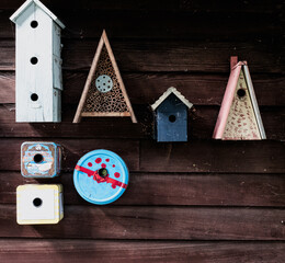 Improvised Bird Nesting Boxes On The Side Of A Shed