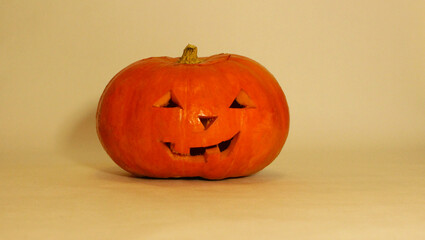 Halloween carved pumpkin on white background