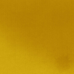 A yellow vintage rough sheet of carton. Recycled environmentally friendly cardboard paper texture. Simple and bright minimalist papercraft background.