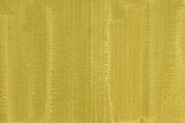 A yellow vintage rough sheet of carton. Recycled environmentally friendly cardboard paper texture. Simple and bright minimalist papercraft background.

