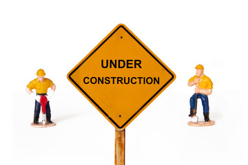 small figures worker  with under construction concept