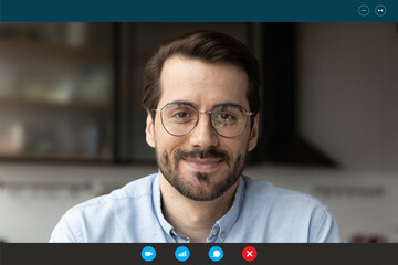 Head shot portrait screen view man wearing glasses using app, webcam, looking at camera, chatting...