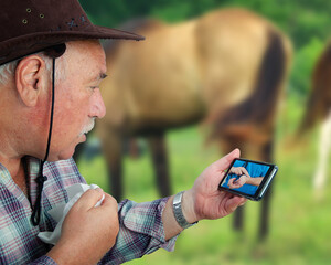 Telemedicine physician teaches a remote rural patient to measure his pulse on wrist