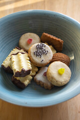 Group of delicious sweet Christmas cookies, white vanilla rolls, gingerbread, linzer and chocolate sweets wiht jam filling