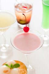 Close up of pink smoothie cocktail serve in martini glass