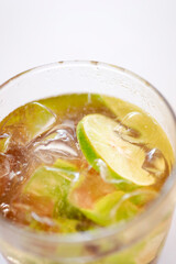 Close up of lime in mojito cocktail glass