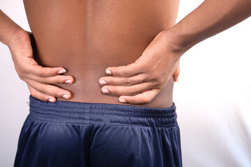 Fototapeta premium young man suffering back pain close up