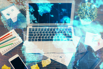 Multi exposure of business theme icons and work space with computer background. Concept of success.