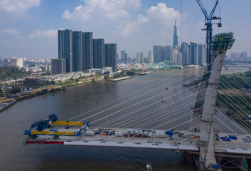 Fototapeta na wymiar Thu Thiem Cable-Stayed Bridge across the Saigon River in Ho Chi Minh City Vietnam under construction 2020