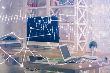 Double exposure of chart and financial info and work space with computer background. Concept of...