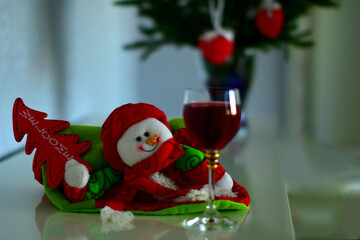 red wine and christmas decorations