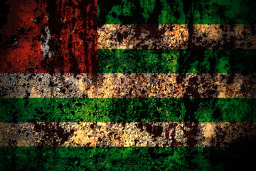 Abkhazia, Abkhzian flag on grunge metal background texture with scratches and cracks
