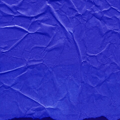 Obraz premium Blue and violet torn paper collage close-up. Texture made from various paper and cardboard parts. Damaged old paper background. Vintage blank wallpaper. Material design backdrop.