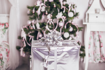 Christmas and New Year holiday decorated room, tree with gifts and toys