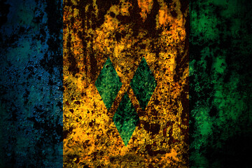 Saint Vincent and the Grenadines flag on grunge metal background texture with scratches and cracks