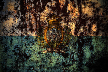 San Marino flag on grunge metal background texture with scratches and cracks
