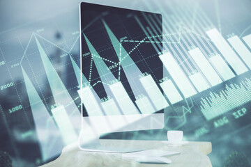 Stock market graph and table with computer background. Double exposure. Concept of financial analysis.