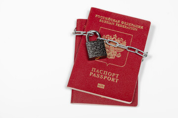 Russian passport with a lock closed on a white background