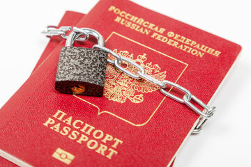 Russian passport with a lock closed on a white background