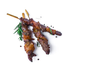 Grilled beef meat with rosemary and pepper isolated