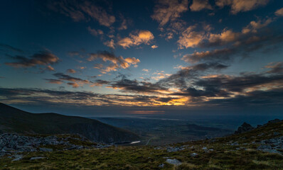 Fototapeta premium Sunset over North Coast of Wales from mountains in Snowdonia National Park