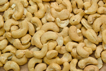 Cashew nuts. Cashew kernels. Clean organic nuts retro background. Organic healthy food.