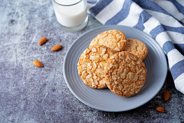 Cookies with almond with glass of milk