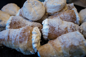 puff pastry creme roll with cream traditional Czech dessert on wooden board