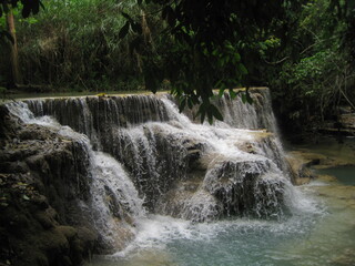 Obraz premium Backpacking through the waterfalls and jungles down the Mekong River in Laos, Southeast Asia