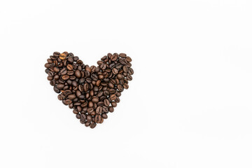 Coffee beans heart shaped isolated on white background