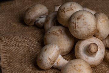Fresh Button Mushroom on wooden table.