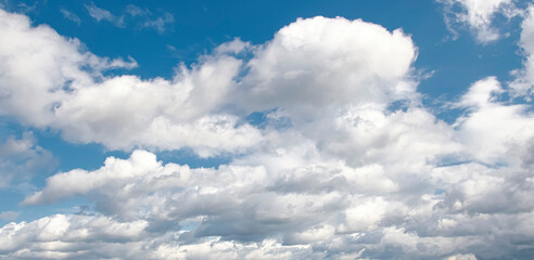 Naklejka na ściany i meble Blue sky with a many clouds. Design element for a background.