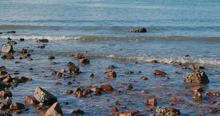 Sea wave over the rock