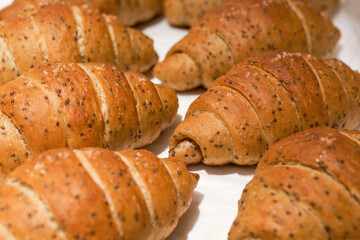 Close-up of a whole roasting pan of French croissant
