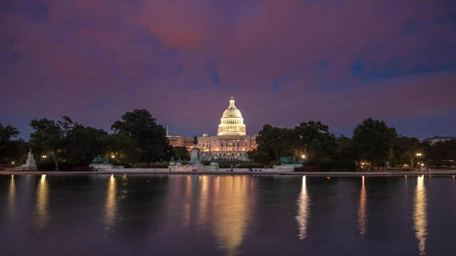 US Capitol Building day to night timelapse with fireworks at night, Washington DC.