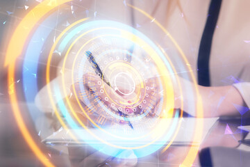 Technology theme hologram over woman's hands taking notes background. Concept of Tech. Double exposure