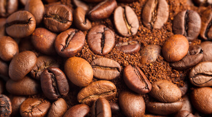 Coffee beans and coffee powder (ground coffee) brown background.