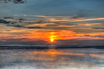 Sonnenuntergang am Deich von Nordstrand bei Husum