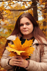 Happy Woman Enjoying Life in the Autumn on the Nature