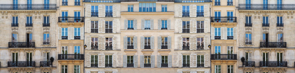 Fototapeta na wymiar Classic urban architecture panoramic background. Street of the downtown of Paris, France